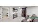 Inviting basement area with a TV, comfortable seating, and plenty of space for relaxing at 3064 S Holly Pl, Denver, CO 80222