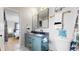 Stylish bathroom featuring double sinks, modern fixtures, and contemporary decor for an elegant look at 3064 S Holly Pl, Denver, CO 80222