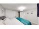 Comfortable bedroom with plenty of closet space and bright neutral colors at 3064 S Holly Pl, Denver, CO 80222