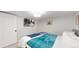 Comfortable bedroom with a TV and a calming, neutral palette at 3064 S Holly Pl, Denver, CO 80222