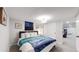 Cozy bedroom featuring a comfortable bed, soft lighting, and a neutral color scheme at 3064 S Holly Pl, Denver, CO 80222