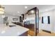 Well-equipped kitchen with stainless steel appliances and quartz countertops at 3064 S Holly Pl, Denver, CO 80222