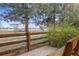 Backyard view with lush landscaping, providing a private and serene outdoor setting at 14820 E Maplewood Dr, Centennial, CO 80016