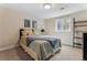 Cozy bedroom with a comfortable bed, window, and tasteful decor providing a relaxing atmosphere at 14820 E Maplewood Dr, Centennial, CO 80016