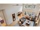 Bright living room features high ceilings, hardwood floors, and large windows offering lots of natural light at 14820 E Maplewood Dr, Centennial, CO 80016