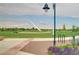 Community park features walking trails, sundial and landscaping at 9580 E 5Th Ave, Denver, CO 80230