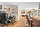 View of entryway, showing the desk space and furniture in living room at 9783 Zephyr Dr, Broomfield, CO 80021