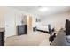 Large bedroom with a workspace, closet, and neutral decor at 3964 S Yosemite St, Denver, CO 80237