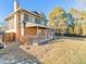 House exterior showcasing backyard and deck at 7649 E Amherst Ave, Denver, CO 80231