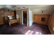 Bedroom with wood walls, carpeted floor, and natural light; a cozy space ready for personalization at 605 Argentine St, Georgetown, CO 80444