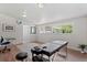 Open basement area with hardwood floors, ideal for flexible living space at 4125 Pierce St, Wheat Ridge, CO 80033