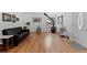 Cozy living room features hardwood floors, a fireplace, and natural light at 4125 Pierce St, Wheat Ridge, CO 80033