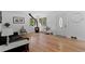 Bright living room with hardwood floors and stylish decor and lots of natural light at 4125 Pierce St, Wheat Ridge, CO 80033