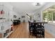 Spacious living area seamlessly connects to the dining space with lots of natural light at 4125 Pierce St, Wheat Ridge, CO 80033