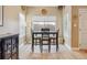 Eat-in dining area features natural light, neutral paint, and modern decor at 3847 Mossy Rock Dr # 104, Highlands Ranch, CO 80126