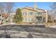 Inviting condo complex with spacious parking and well-manicured landscaping providing curb appeal at 3847 Mossy Rock Dr # 104, Highlands Ranch, CO 80126