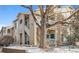 Multi-level condo boasts well-maintained exterior with inviting balconies and convenient access to each floor at 3847 Mossy Rock Dr # 104, Highlands Ranch, CO 80126