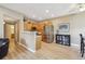 Bright kitchen featuring stainless steel appliances and light wood cabinets and adjacent dining area at 3847 Mossy Rock Dr # 104, Highlands Ranch, CO 80126