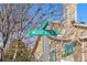 Prominent street sign displays the intersection of Mossy Rock Dr. and Cable Creek Way, clearly marking location at 3847 Mossy Rock Dr # 104, Highlands Ranch, CO 80126
