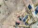 Aerial view of home and property, including an outbuilding, fenced yard and field at 56450 E 40Th Ave, Strasburg, CO 80136