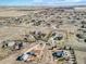 Aerial view of a new residential development featuring neatly organized homes and spacious lots in a countryside setting at 56450 E 40Th Ave, Strasburg, CO 80136
