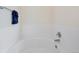 Bright white tub and tile in this bathroom are ready for your personal touch at 56450 E 40Th Ave, Strasburg, CO 80136