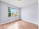 Bright room with large windows offering ample natural light and laminate flooring at 56450 E 40Th Ave, Strasburg, CO 80136