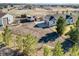 Well-maintained home with attached two-car garage, storage building, and RV parking on a large lot at 56450 E 40Th Ave, Strasburg, CO 80136
