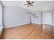 Spacious living room featuring high ceilings and laminate flooring at 56450 E 40Th Ave, Strasburg, CO 80136