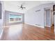 Spacious living room with a large window, vaulted ceilings, and light-colored walls at 56450 E 40Th Ave, Strasburg, CO 80136