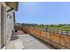 View of the backyard featuring a wooden fence and views of the neighborhood at 6700 Clay St, Denver, CO 80221