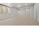 Spacious finished basement offering recessed lighting and several windows at 6700 Clay St, Denver, CO 80221