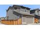 Exterior view of a modern two-story home with attached garage at 6700 Clay St, Denver, CO 80221