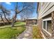 Stone path leading to a charming covered patio in the backyard with beautiful views at 7181 Beech St, Arvada, CO 80004