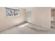 Empty bedroom with soft carpet and a window at 7181 Beech St, Arvada, CO 80004