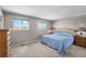Bright bedroom with natural light and soft carpet at 7181 Beech St, Arvada, CO 80004