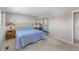 Bedroom with a closet featuring mirrored doors at 7181 Beech St, Arvada, CO 80004
