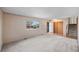 Living room with large window and ample natural light at 7181 Beech St, Arvada, CO 80004