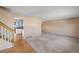 View of the living room and kitchen area at 7181 Beech St, Arvada, CO 80004
