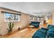 Bright living room featuring hardwood floors and natural light at 7181 Beech St, Arvada, CO 80004