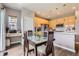 Eat-in kitchen with stainless steel appliances, quartz countertops, and modern cabinetry at 5328 Potentilla St, Brighton, CO 80601