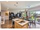 Open concept kitchen and living area with stainless steel appliances at 5328 Potentilla St, Brighton, CO 80601