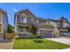 Charming two-story home with a well-maintained lawn and attached two-car garage, perfect curb appeal at 12631 Glencoe St, Thornton, CO 80241
