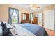 Bedroom with large window and lots of light; adjoining bathroom at 276 N 5Th Ave, Brighton, CO 80601