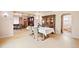 Bright dining room with views to living room and large wood china cabinet for ample storage at 276 N 5Th Ave, Brighton, CO 80601