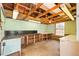 This is the interior of a detached garage that is equipped with work benches and lighting at 276 N 5Th Ave, Brighton, CO 80601