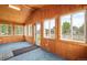 Bright sunroom with wood accents, carpet, and large windows at 276 N 5Th Ave, Brighton, CO 80601