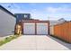 Two-car garage with a spacious driveway, offering ample parking and storage space at 1847 W 41St Ave, Denver, CO 80211