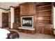 Close up on the main bedroom with built in fireplace and bookshelves at 2208 Stevens Ct, Castle Rock, CO 80109
