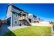 Well-maintained backyard with a small deck and a gravel area at 17955 Sky Pilot Ave, Parker, CO 80134